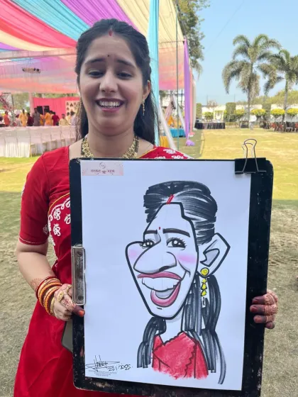 The laughter and joy are what make wedding events so special. This guest was thrilled with her caricature at a vibrant Haldi function in Madhya Pradesh.