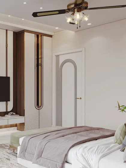 A perspective from the bed, showing the continuity of the arched design motif on the door and wardrobe, creating a harmonious and unified space.