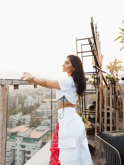 Taking a moment to enjoy the view before my set at a rooftop party. The city skyline provides an amazing backdrop for a sundowner event.