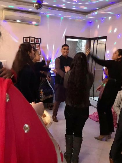 A cosy private Lohri party with friends and family dancing under disco lights. We handle the food and setup so you can enjoy these special moments.