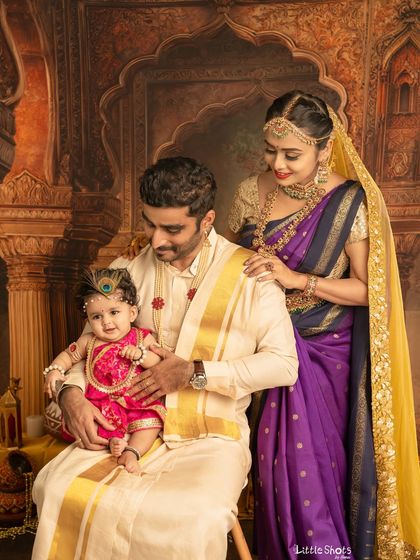 A beautiful family portrait celebrating Janmashtami. The whole family can participate in these cultural shoots, creating a memorable and festive experience.