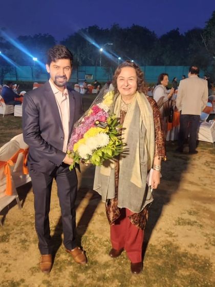 Presenting a bouquet to Senior Advocate Ms. Pinky Anand at the lawyers' meet she organized. It was an honor to be part of the event.