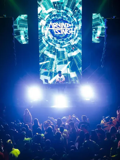 A full view of my stage setup at Sunburn, with my custom visuals on the towering LED screen. This is what a world-class club experience looks like.