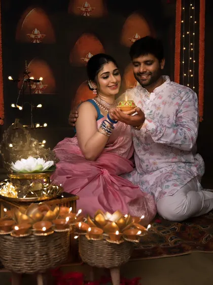 A beautiful couple shares a diya, celebrating the festival of lights together in our studio.
