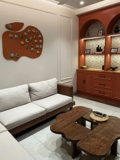Here is a finished "Travel Diary" piece installed in a client's beautiful Mumbai home. This apple-shaped textured board holds dozens of miniature paintings, each one a memory from their family travels. It's a statement piece that's deeply personal.