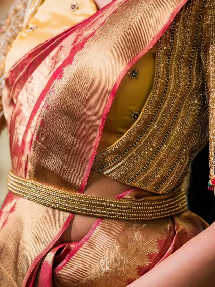 The front view of the hand-embellished bridal blouse, showing the intricate patterns and the flattering silhouette created by the detailed workmanship.