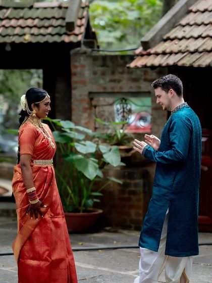 The "first look" is always a special moment. Here, the groom reacts with delight upon seeing his bride for the first time.