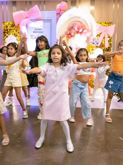 Kids showing off their dance moves at a party. I always ensure there's great music and an energetic host to get everyone on the dance floor.