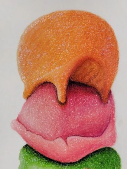 A detail shot of the top two scoops, showing how the orange syrup drips over the pink ice cream.
