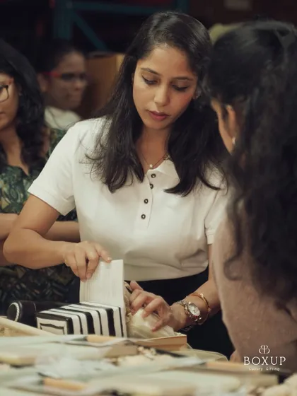 Our Co-founder and CCO, Kruthi, in her element. Curating the perfect hamper is second nature to her, and she is hands-on in the process.