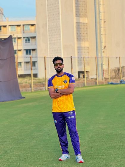 One boundary at a time. Posing on the field in my team jersey, feeling the energy of the game and focused on the goal ahead.