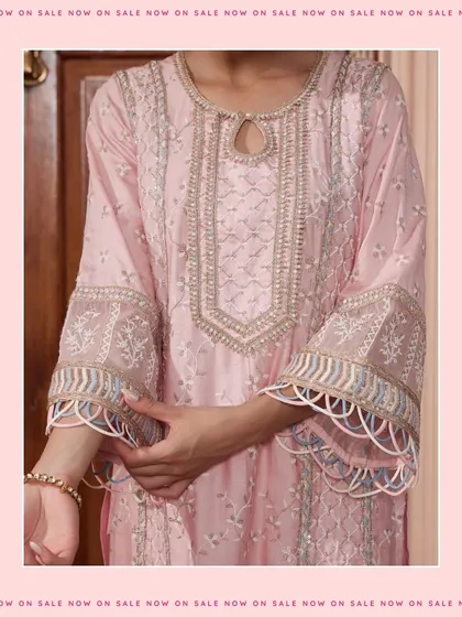 A close up of the intricate embroidery on the Briti Pink Kurta Set. The craftsmanship on this piece is truly special.