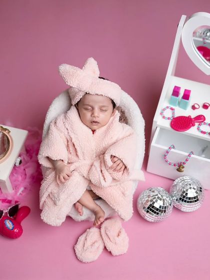 Adding a cute little headband to the spa day outfit completes the look for this pampered princess.