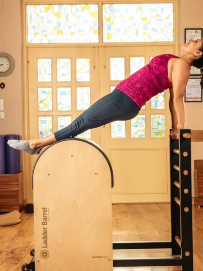 The Ladder Barrel is fantastic for building a strong posterior chain. This reverse plank position strengthens the back, glutes, and hamstrings, all while opening up the chest and shoulders.