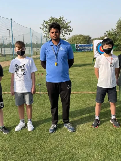 Our coaching welcomes archers from all over the world. Coach Ankit is seen here with a group of international students, sharing his expertise with a diverse group of learners.