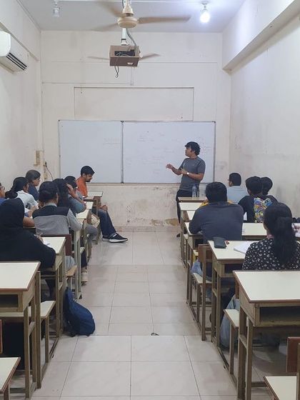 A wide shot of the classroom session at R.D. National's College, where we discussed core self-defense principles before a live demonstration.