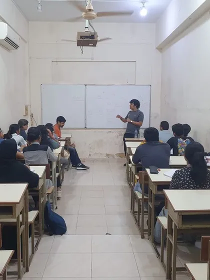 A wide shot of the classroom session at R.D. National's College, where we discussed core self-defense principles before a live demonstration.