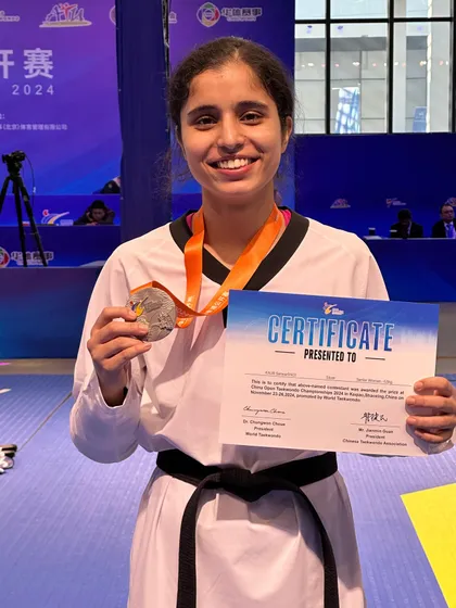 Sarwar Kaur proudly displays her Silver medal from the China Open 2024. A fantastic achievement for one of our promising young athletes.
