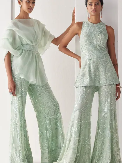 Sleek, structured, and stunning. These mint green Indo-Western sets are perfect for sangeets and soirée nights. Style it, own it, rule it.