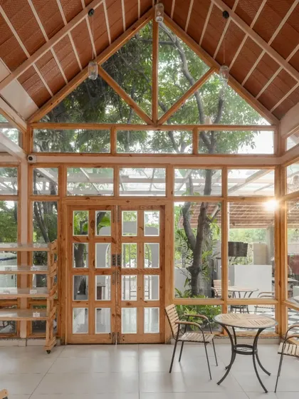 A duplicate of the main dining hall, reinforcing the spacious, light-filled interior.