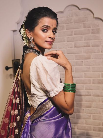 A portrait from the vintage shoot, capturing a timeless and thoughtful expression.