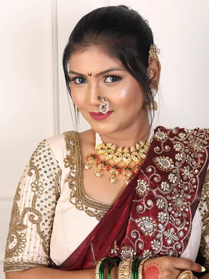 A direct look that captures the confidence and beauty of the bride in her full attire.