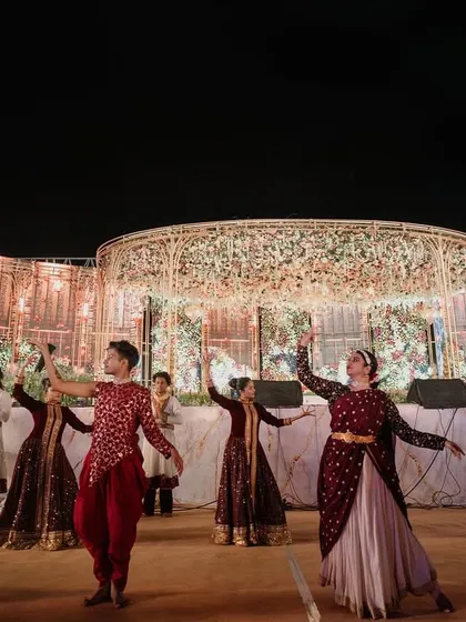 A beautifully choreographed dance performance on the grand wedding stage, adding a touch of classical elegance to the celebration.