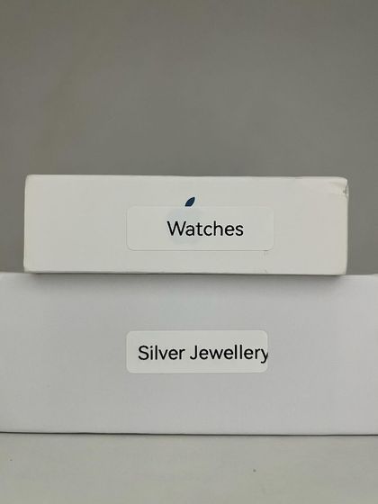 You don't always need to buy expensive organizers. I'm a big believer in reusing what you already have. Simple delivery boxes, when labeled clearly, become effective, budget-friendly, and eco-friendly storage for everything from jewelry to chargers.