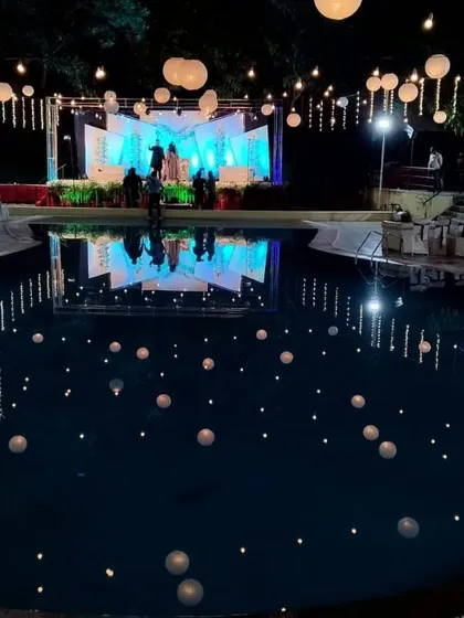 Imagine having your wedding reception here. This is one of my resort venues in Panvel with a stunning poolside stage setup, perfect for giving your event a destination wedding feel without leaving Navi Mumbai.