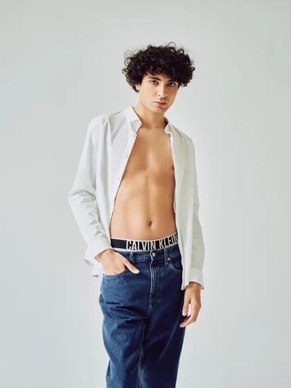 Part of a campaign celebrating diversity, this shot features a simple, classic look. I styled an open white shirt with iconic Calvin Klein jeans and underwear for a timeless and relaxed feel.
