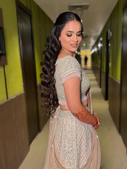 The full effect of the hair and makeup. This is a perfect look for a sangeet or reception.