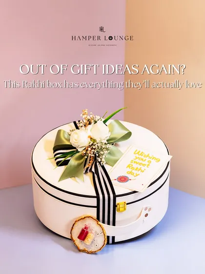 The elegant white leatherette box, closed and tied with a beautiful ribbon. This view highlights the sophisticated packaging that makes the gift feel special from the moment it's received.