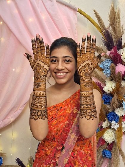 The beautiful smile of a happy bride says it all! It's a joy to see my clients so thrilled with their final mehendi designs.