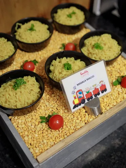 Freshly made Masala Maggi served in individual bowls, ready for guests to enjoy. This classic comfort food is always a favorite at our parties.