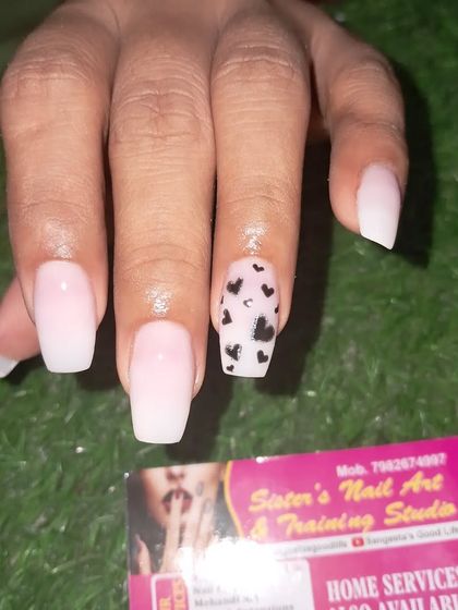 Another angle of the popular tiny hearts nail art.