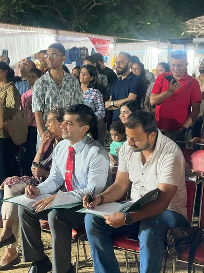 Here I am with a fellow judge, carefully scoring the participants. We took our responsibility seriously to ensure a fair and encouraging competition for everyone.