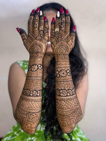 Another pose with the same intricate full-arm design, showing its beautiful detail and coverage.