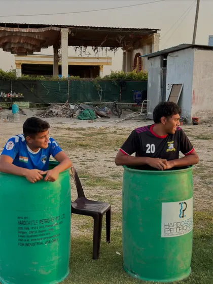 Two players enjoying a well-deserved ice bath after an intense training session. This is essential for muscle recovery and injury prevention.