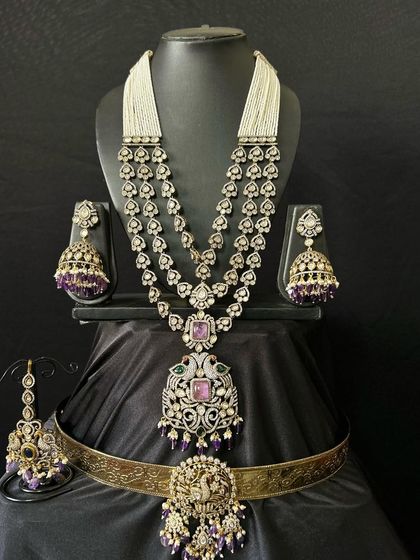 Another view of the purple Victorian long necklace set. The combination of kundan work, pearls, and purple stones is truly exquisite.