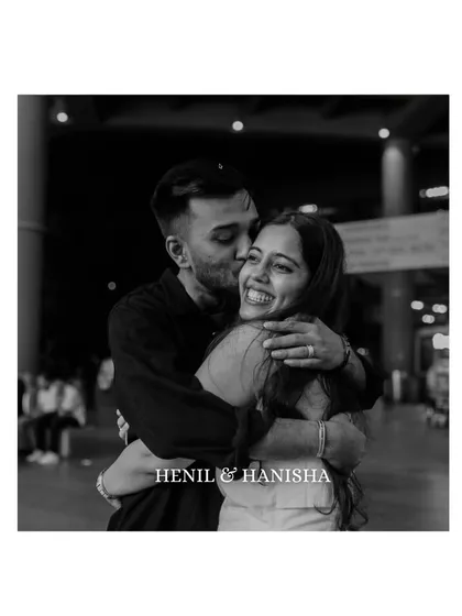 After the big question, there's the afterglow. This black and white portrait shows the pure, unposed joy between Henil and Hanisha. We stay back to capture these quiet, intimate hugs and happy tears, focusing on the real connection that you share.