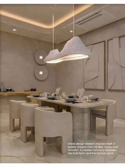 This dining room showcases our belief that great design quietly shapes how we feel. The sculptural light fixture and chairs create harmony between the built form and the human spirit.