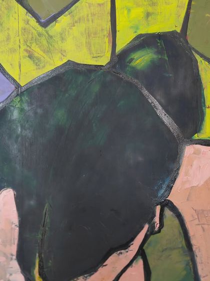 A close up on the bowed head, a central element of the abstract self portrait.