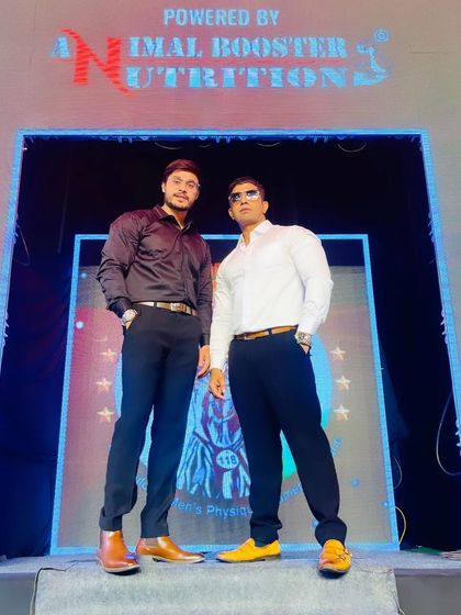 Looking sharp on stage. My presence at these events is about representing professionalism and success.