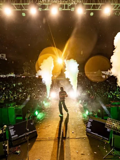 Our production value is second to none. We utilize custom stage setups with dynamic effects like these CO2 cannons at the Sanjith Hegde show to elevate the concert experience from a simple performance to a full sensory spectacle.