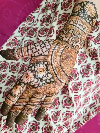 The left hand from the same set, showing a different arrangement of the floral and grid patterns. I love creating designs that are related but not identical.