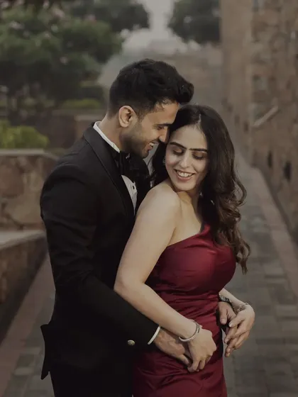 A classic, romantic pre-wedding embrace. This kind of timeless shot focuses purely on the couple's connection and happiness.