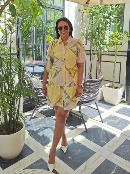 A sunny day look in a yellow and pink printed shirt dress. This is an easy, one-and-done outfit that is full of personality.