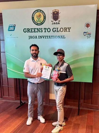 Rayirth Jain receives his 2nd place trophy at the Junior Golf Tournament organized by JAGA and Greens to Glory.