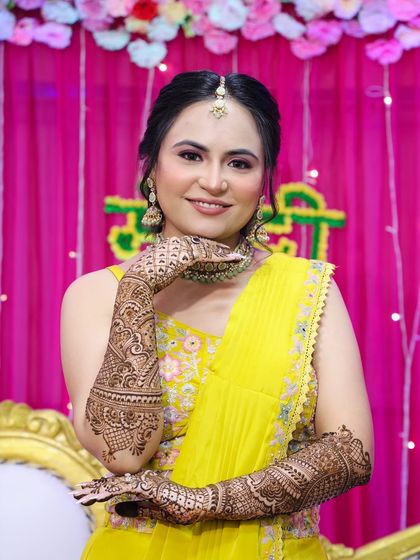 A beautiful portrait of the mehndi bride, her makeup enhancing her natural beauty.