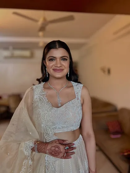 A lovely portrait of the wedding guest. Her hair is styled to perfection, completing her elegant and modern look.